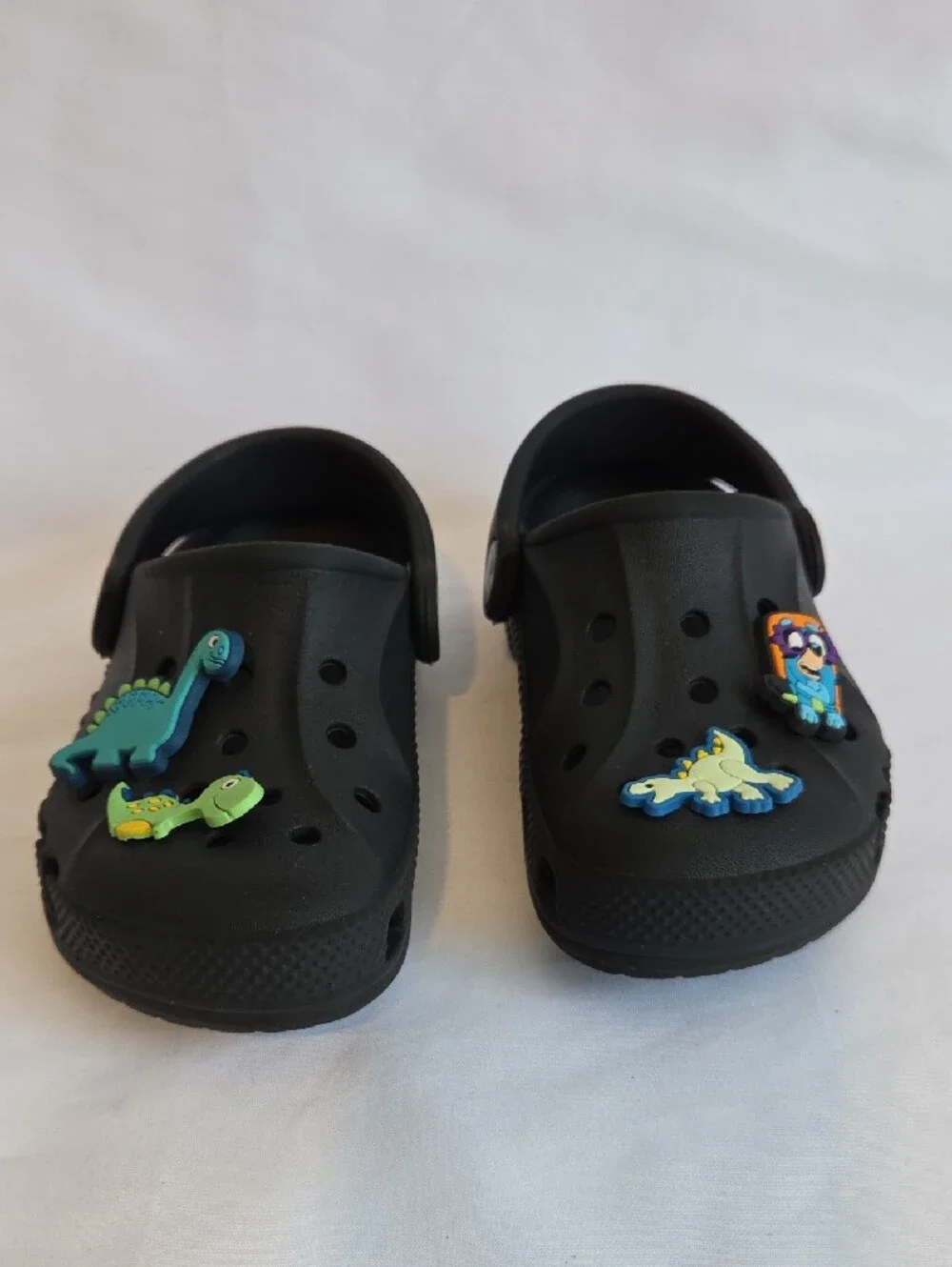 CROCS Black Kids' Clogs with Colorful Dino and Character Charms